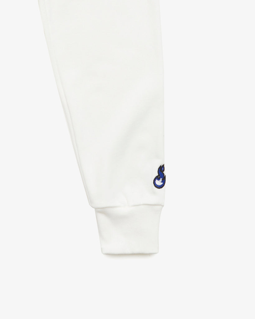 A zoomed in shot on a White Crew Neck , featuring the sleeves and clean embroidery detail-work.