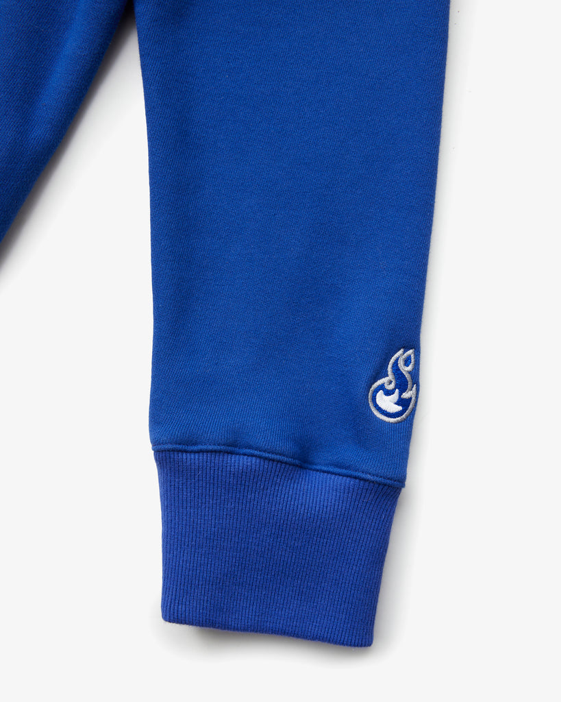 A zoomed in shot of a Blue Crew Neck , featuring the sleeves and clean embroidery detail-work.