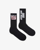 A pair of socks with NY GIANTS NFL FOOTBALL TEAM LOGO, and Agni Atelier logo, featuring the text Made in NY using the OFFICIAL NFL GIANTS Jersey Font. 